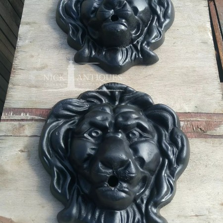 LARGE OLD LION HEADS CAST IRON
